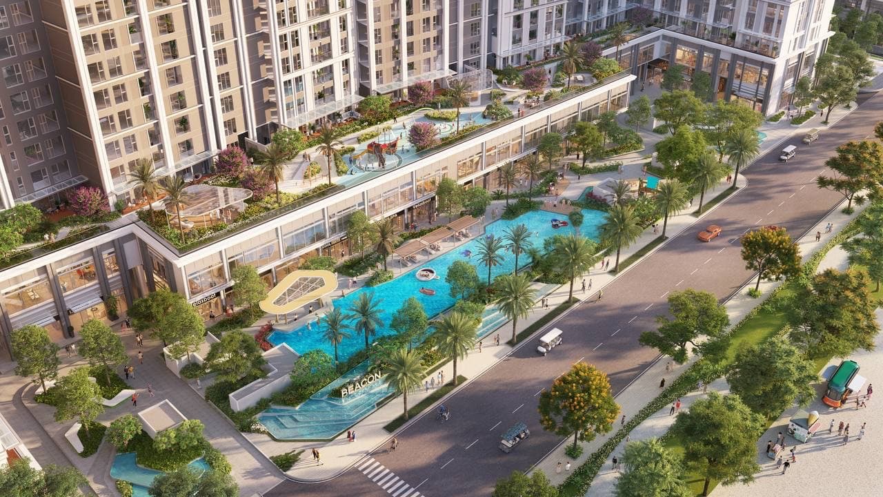 Nhìn từ trên cao bể bơi khối đế Beacon, dãy shophouse, sân chơi trên mái và đường nội khu