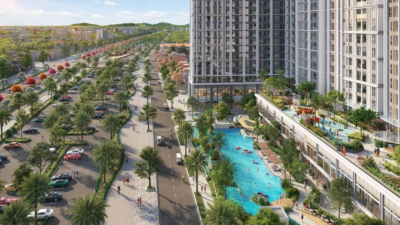Phối cảnh trên cao tháp căn hộ Beacon cạnh đại lộ rợp cây xanh và bể bơi khối đế